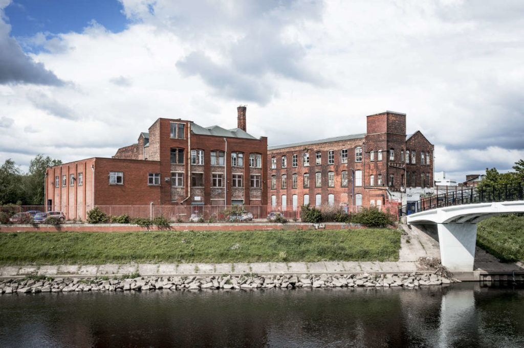 An external view of the Manchester factory of UK luxury menswear brand Private White V.C.
